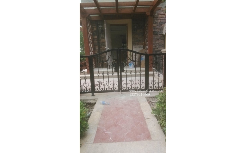 Small wrought iron courtyard gates
