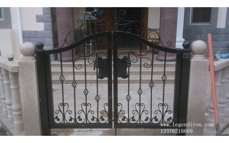 Small wrought iron courtyard gates